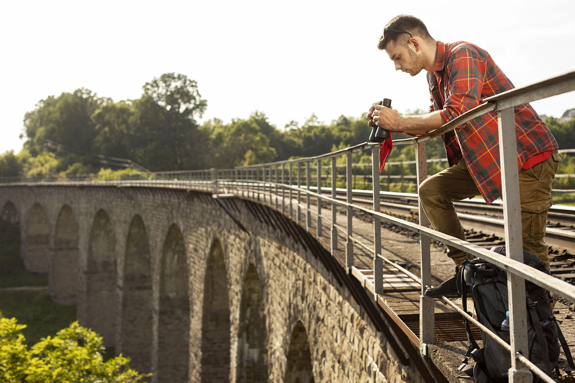 portrait-man-bridge-with-binocular portrait-man-bridge-with-binocular